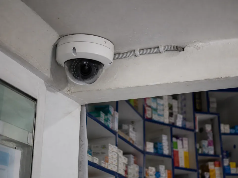 Dome CCTV camera installed with conduit in a pharmacy